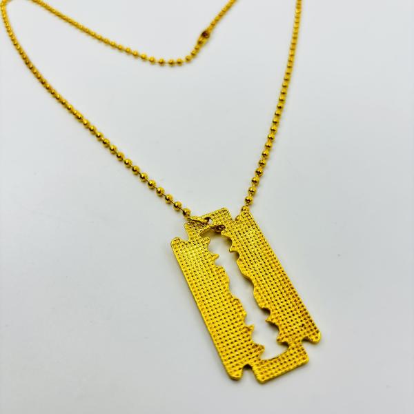 COLLAR FIGURA NAVAJILLA DORADO
